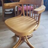 Fauteuil pivotant en bois