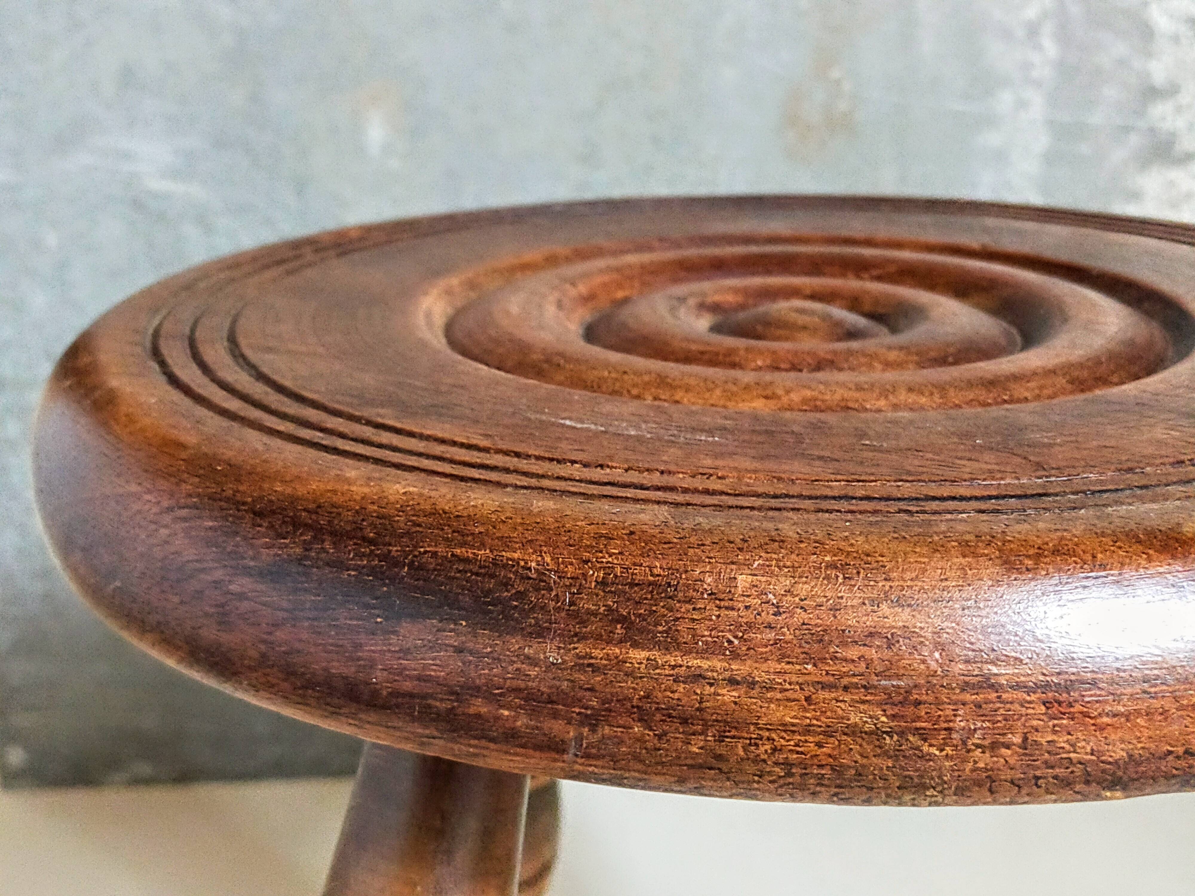 Low tripod stool in vintage turned solid wood