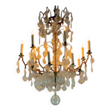 Gilt bronze cage chandelier decorated with glass pendants in the shape of peacock feathers circa 1800
