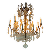 Lustre cage en bronze doré garni de pampilles en verre en forme de plumes de paon vers 1800
