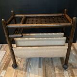 Vintage rattan magazine rack on wheels