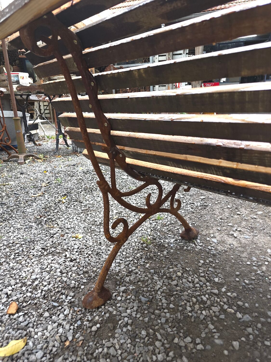 Cast iron garden bench with wooden slats
