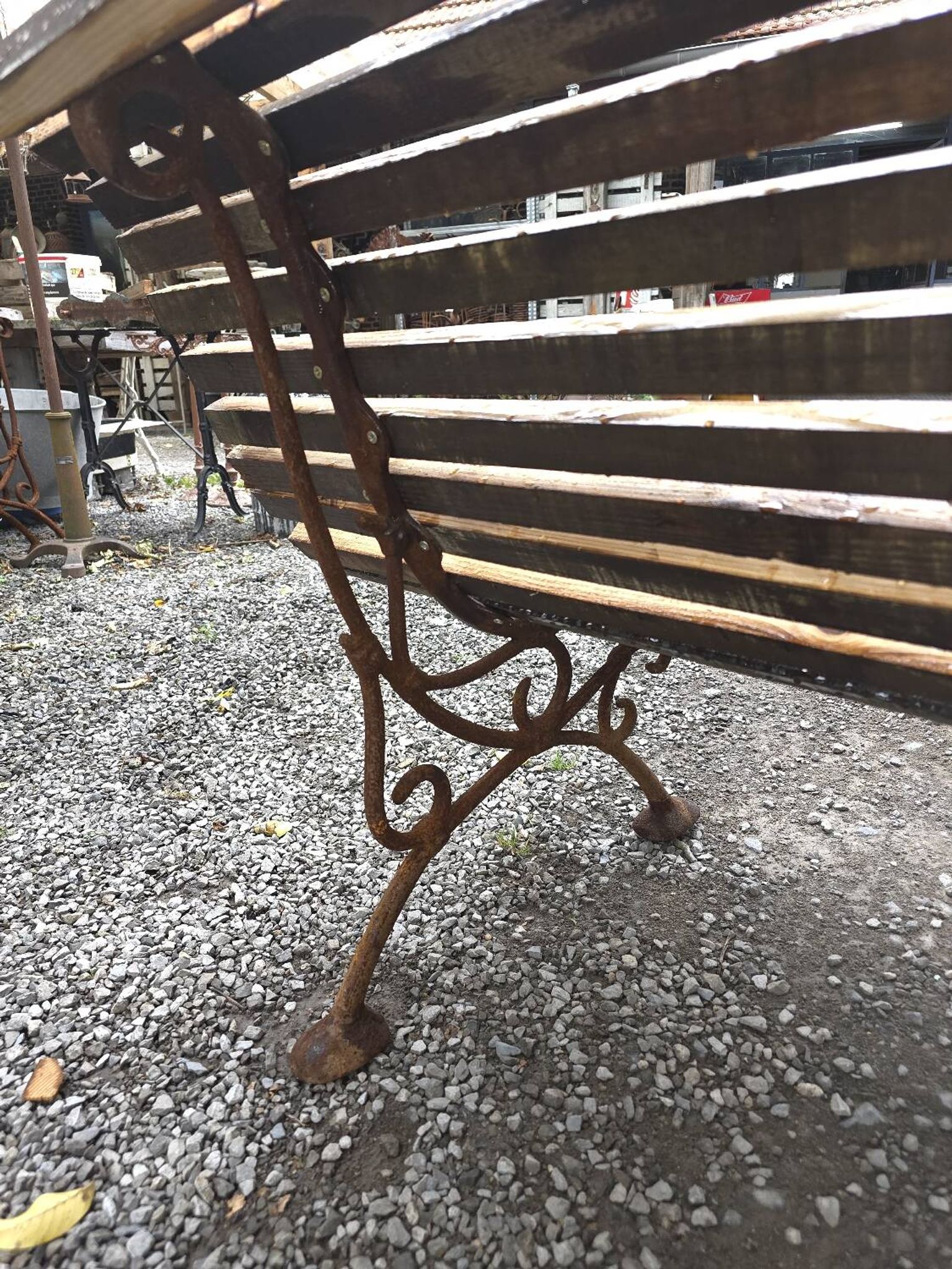 Cast iron garden bench with wooden slats