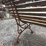 Cast iron garden bench with wooden slats