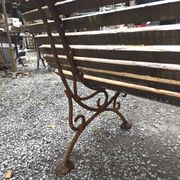 Cast iron garden bench with wooden slats