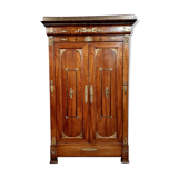 Louis Philippe period wardrobe (nineteenth) entirely covered with gilded bronzes