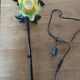 Art-deco style wall lamp with black metal support and foliage and glass paste tulip