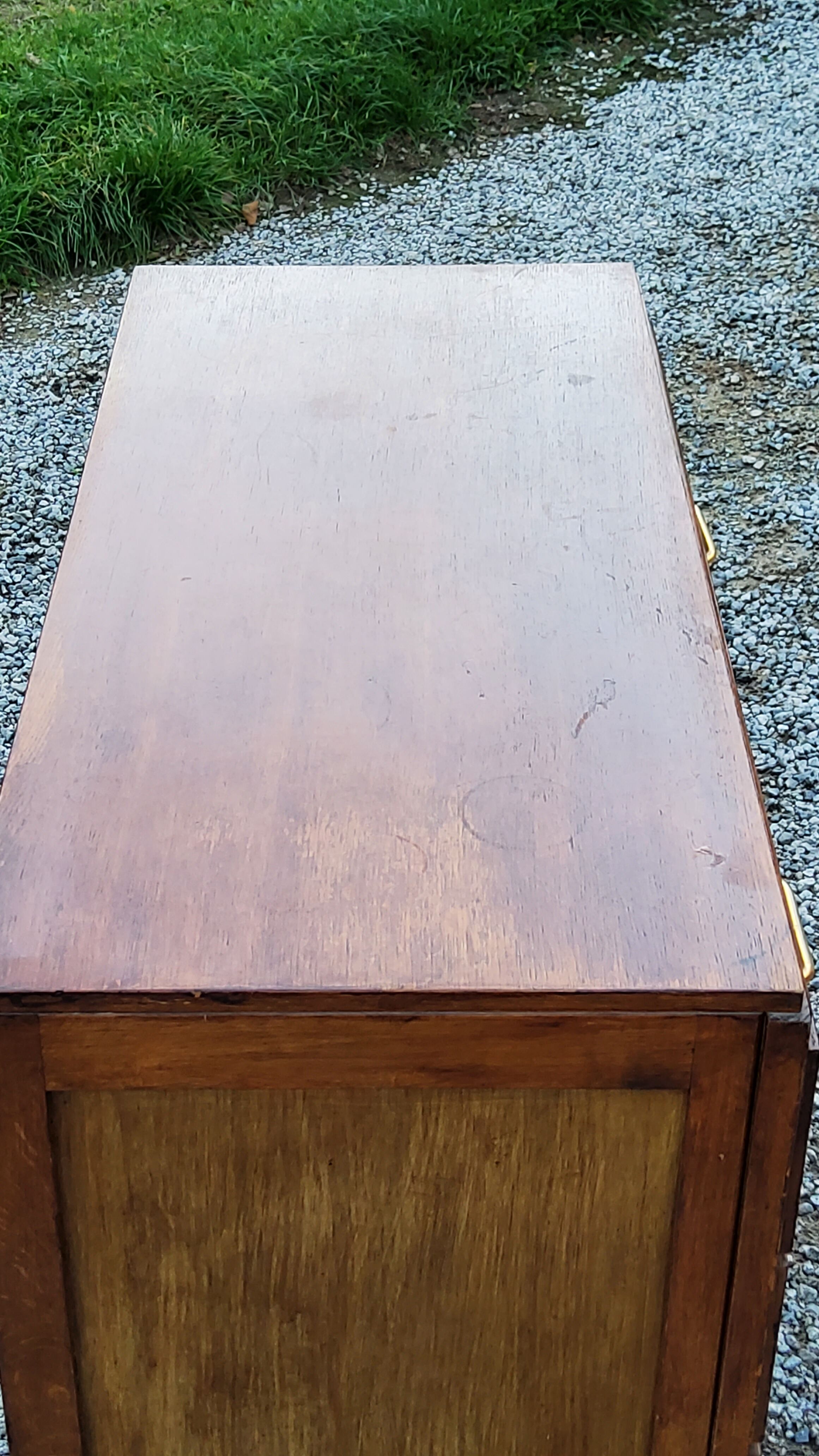Chest of drawers of the 50s in golden oak compass feet 4 drawers