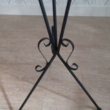 Plant holder in black wrought iron.