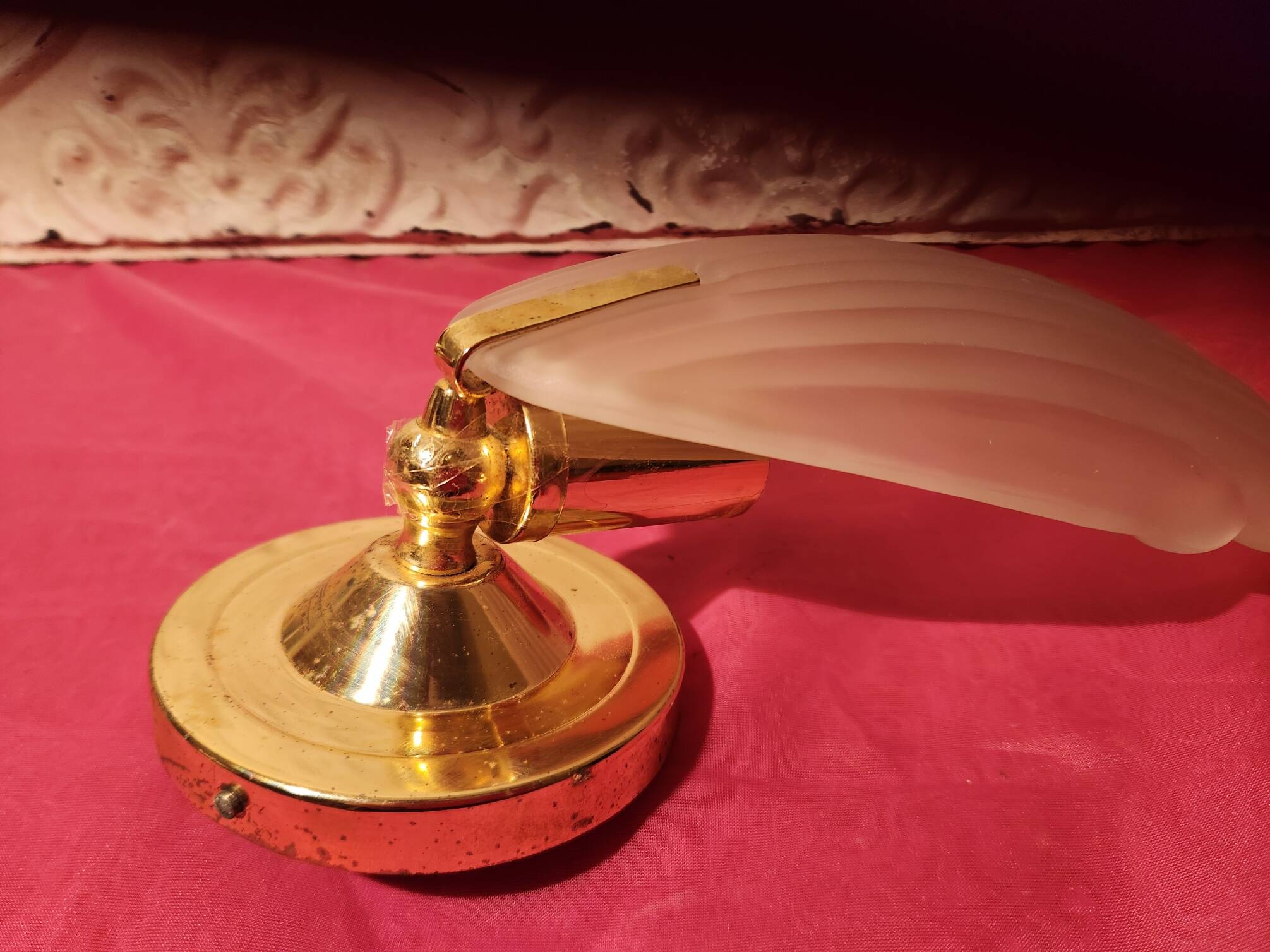 Pair of vintage brass wall lights with opaque glass shells