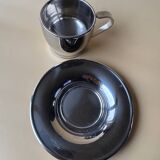Two vintage mid century modern stainless steel coffee cups with saucer