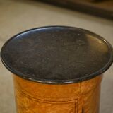 Empire gueridon in mottled maple with a blue stone top, 19th century.