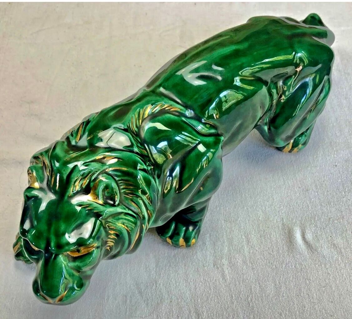 Art Deco lion statue cracked St Clement