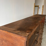 Large wooden workshop cabinet with 16 drawers, antique from the early 1900s.
