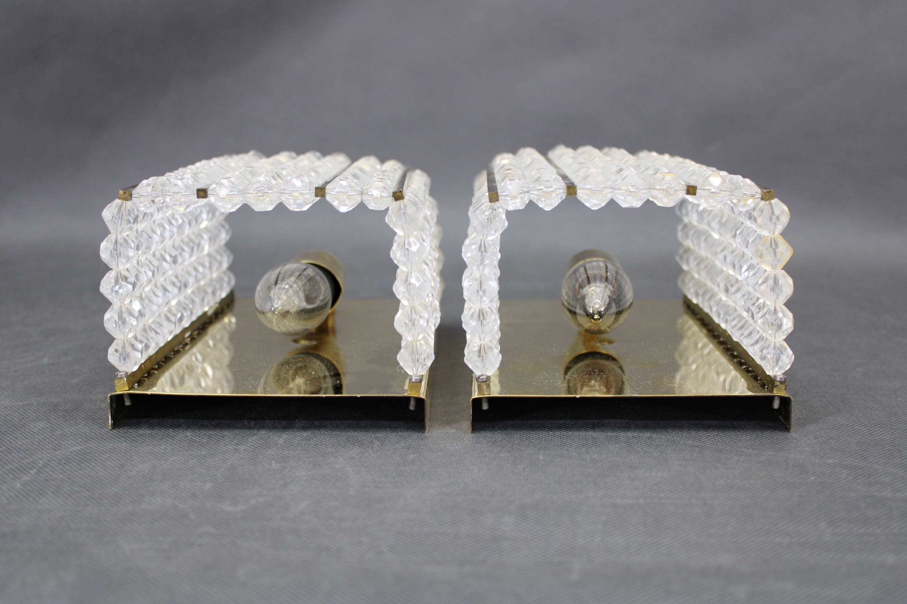 Pair of Austrian mid-century brass and acrylic wall lights, 1970s