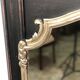 Miroir trumeau en bois noir et argenté patiné de style Louis XV