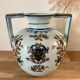 Old vase with floral motif inspired by desvres earthenware