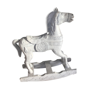 Cheval de bois à bascule