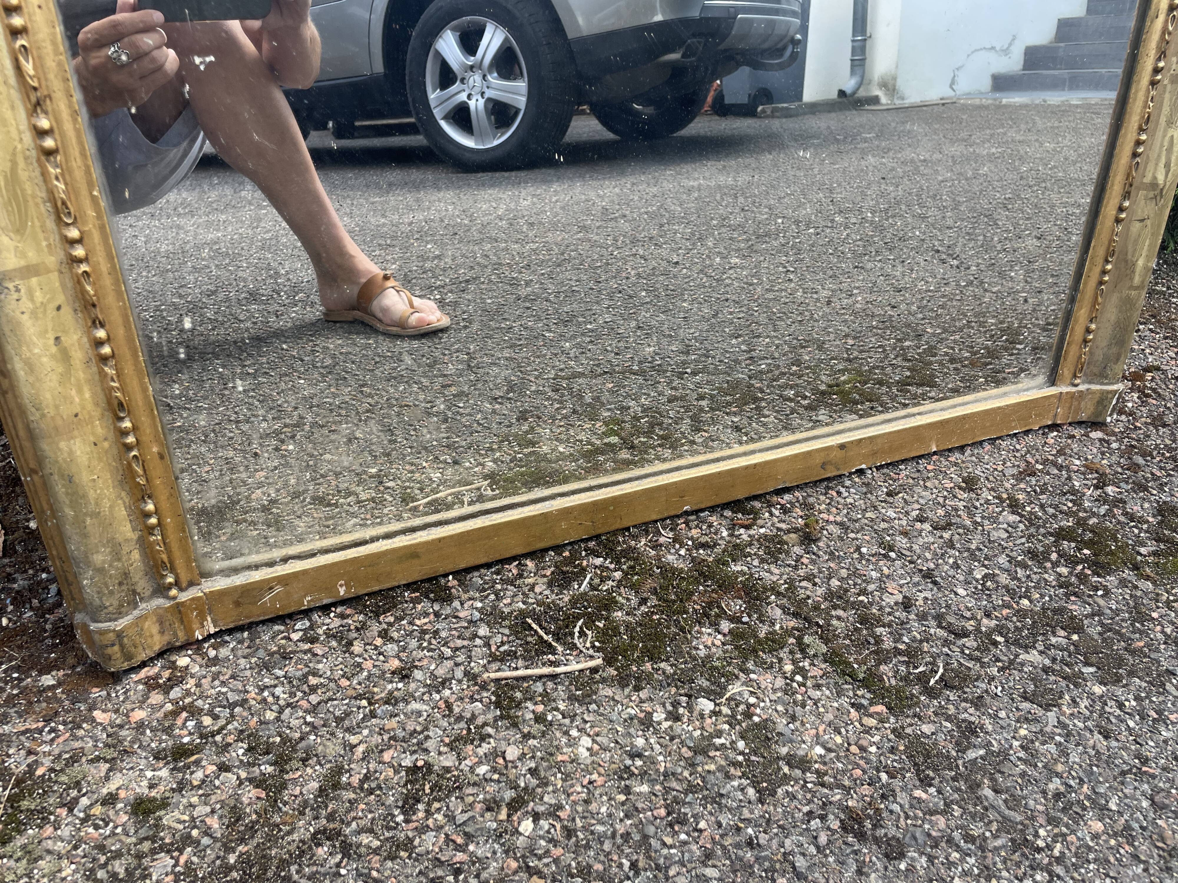 Louis Philippe period mirror with 19th gold leaf