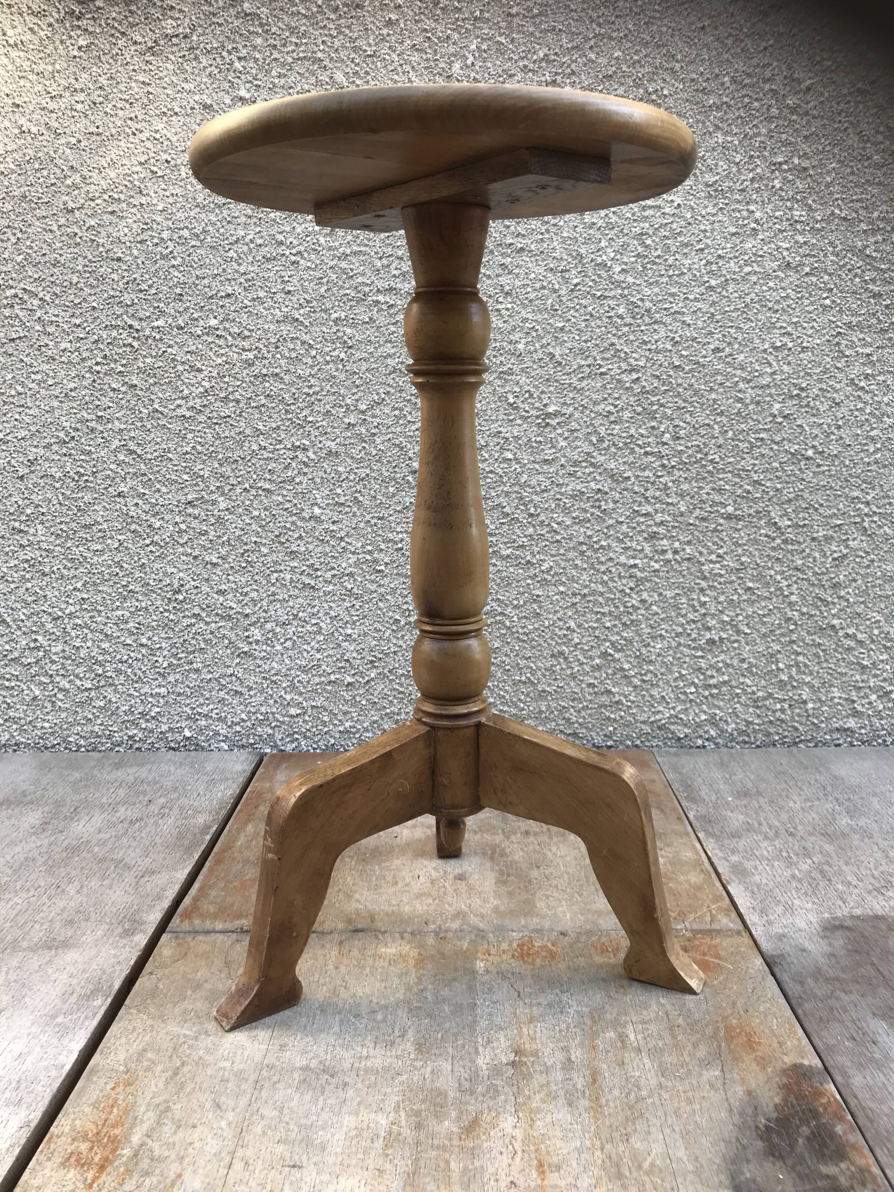 Old vintage wood tripode table