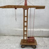 Vintage wooden crane toy from the 60s