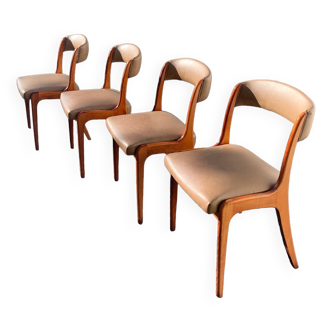 Lot de chaises vintage dans le style scandinave en bois et skaï