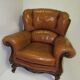 Louis XV style tawny leather chair