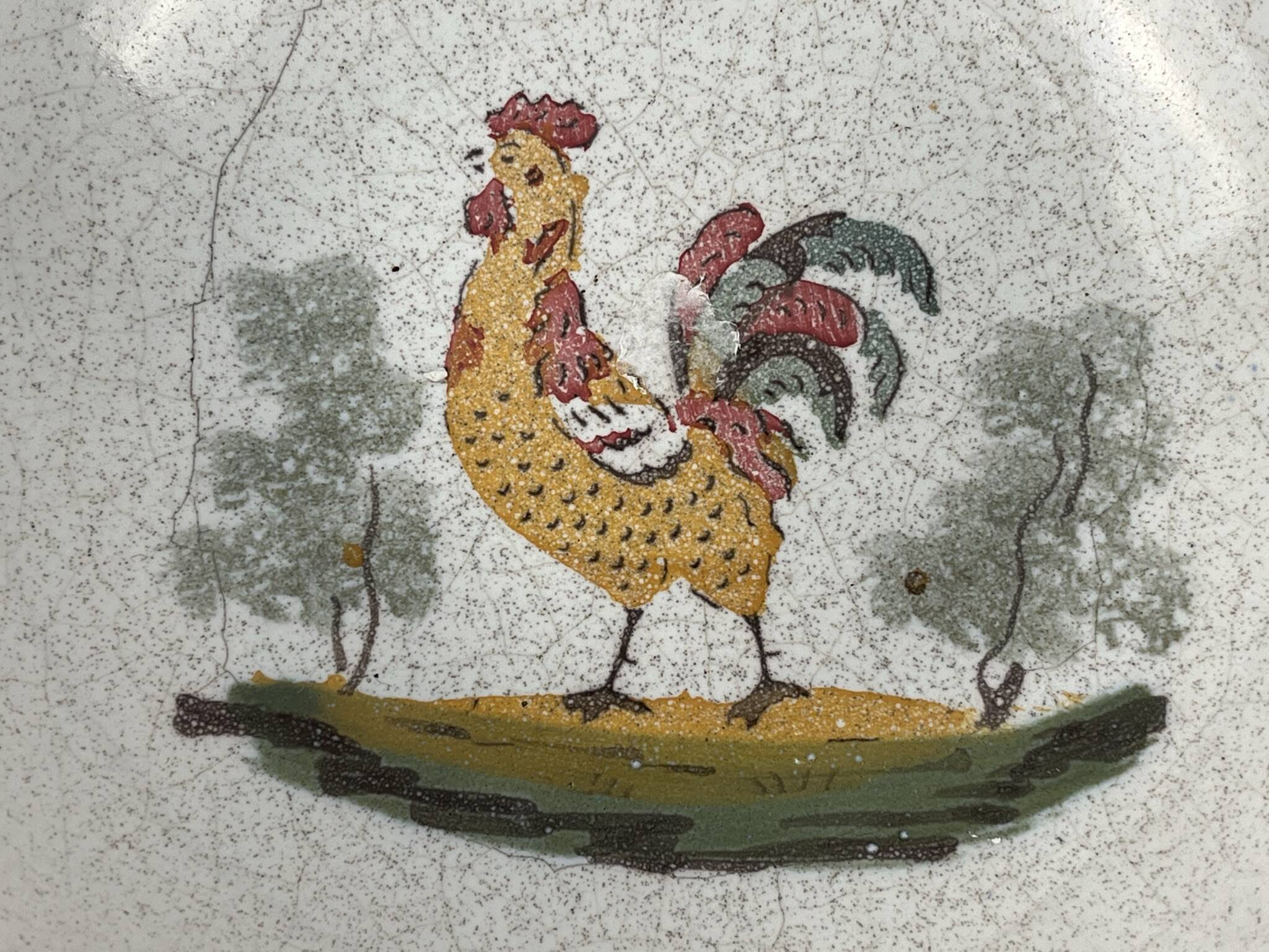 Regional earthenware small hollow dish decorated with 20th century rooster
