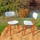 vintage wooden chairs with white faux leather