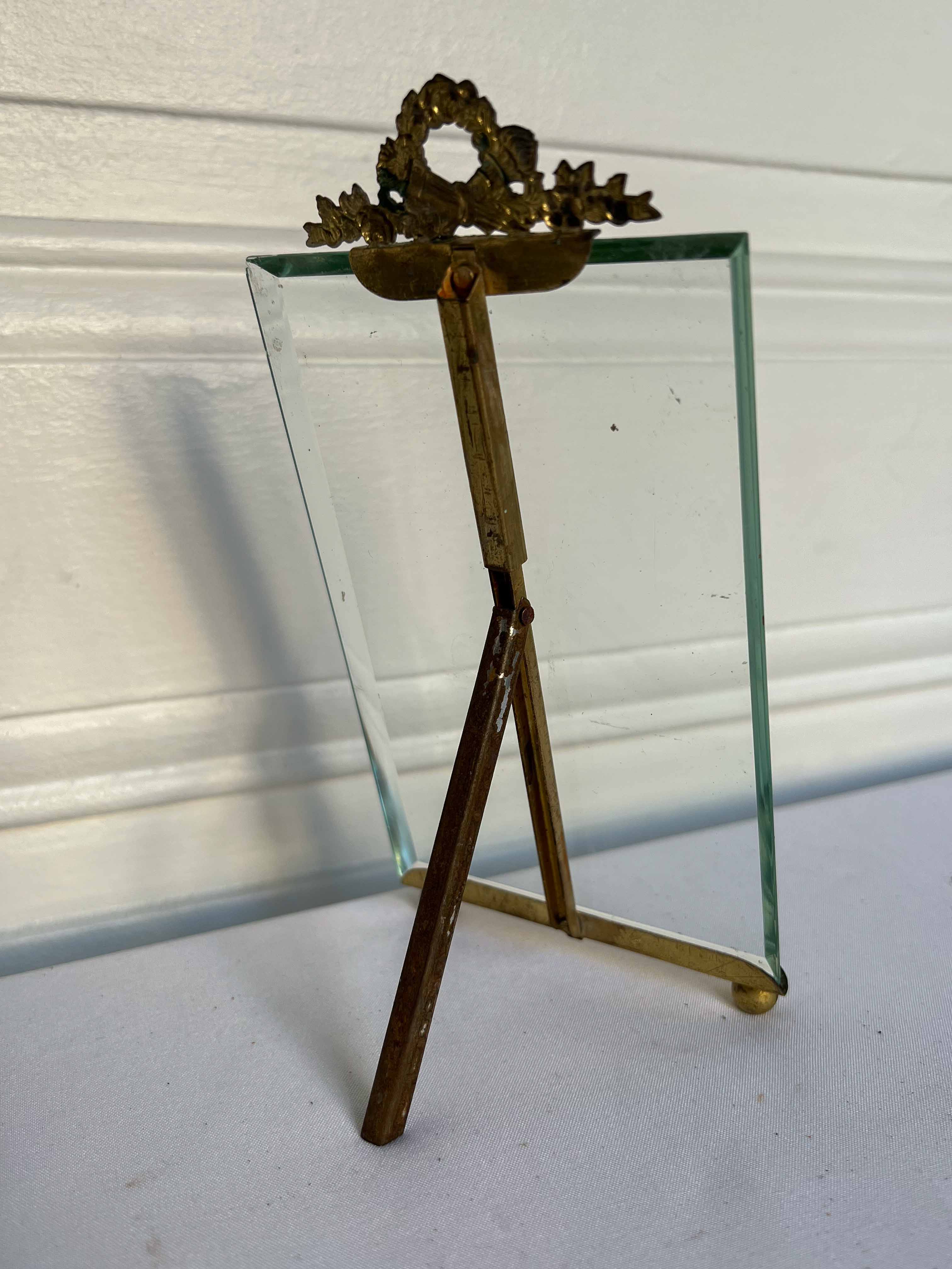 Brass frame and beveled glass