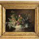 Old oil painting on wood of a bouquet of flowers signed Petit.