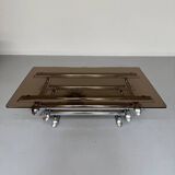 Space coffee table from the 70s, tubular metal and glass, Italian design