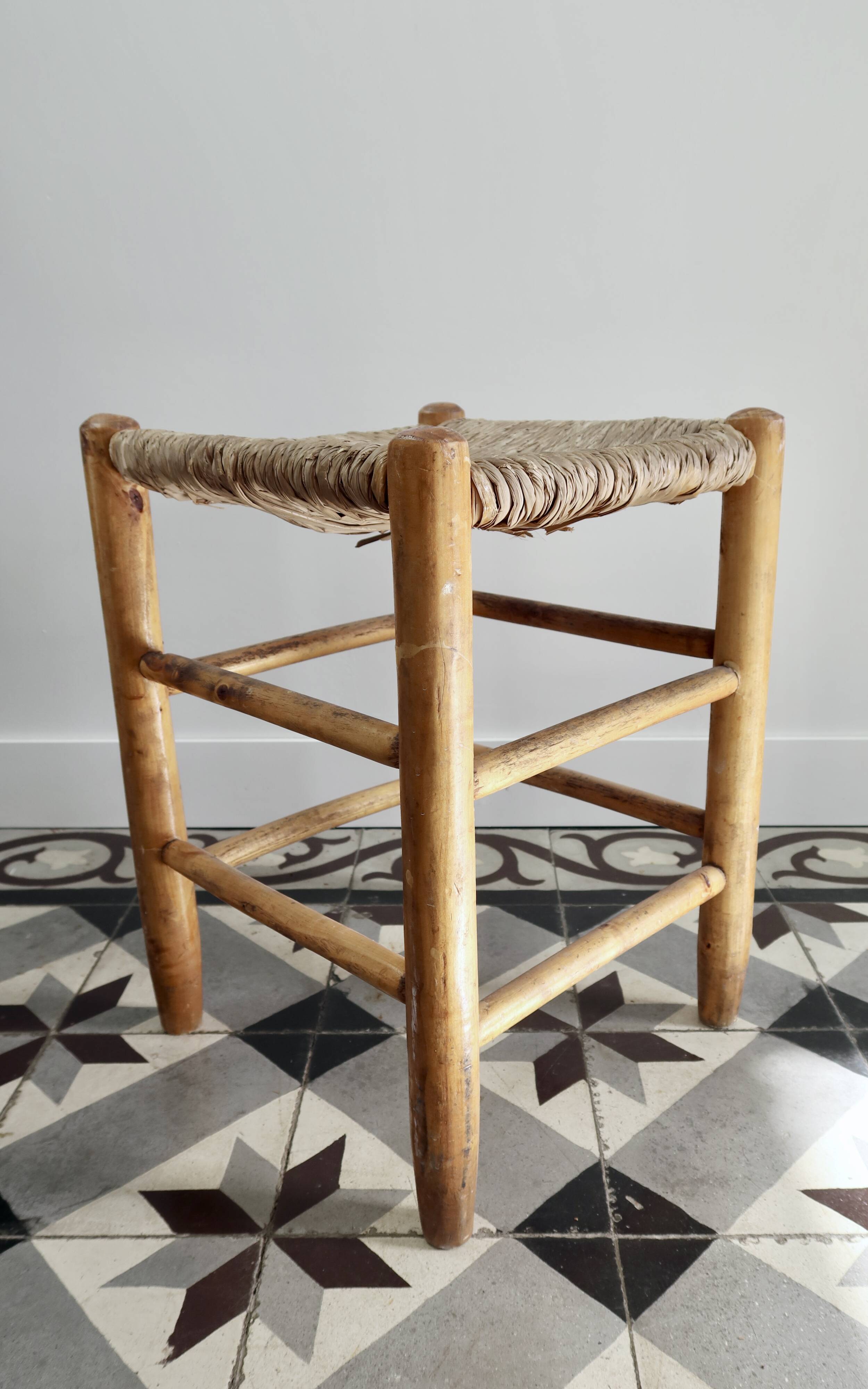 Vintage low stool in wood, honey yellow tones – Woven seat