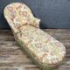 Chaise longue or rest bench Napoleon III era with floral fabric around 1850
