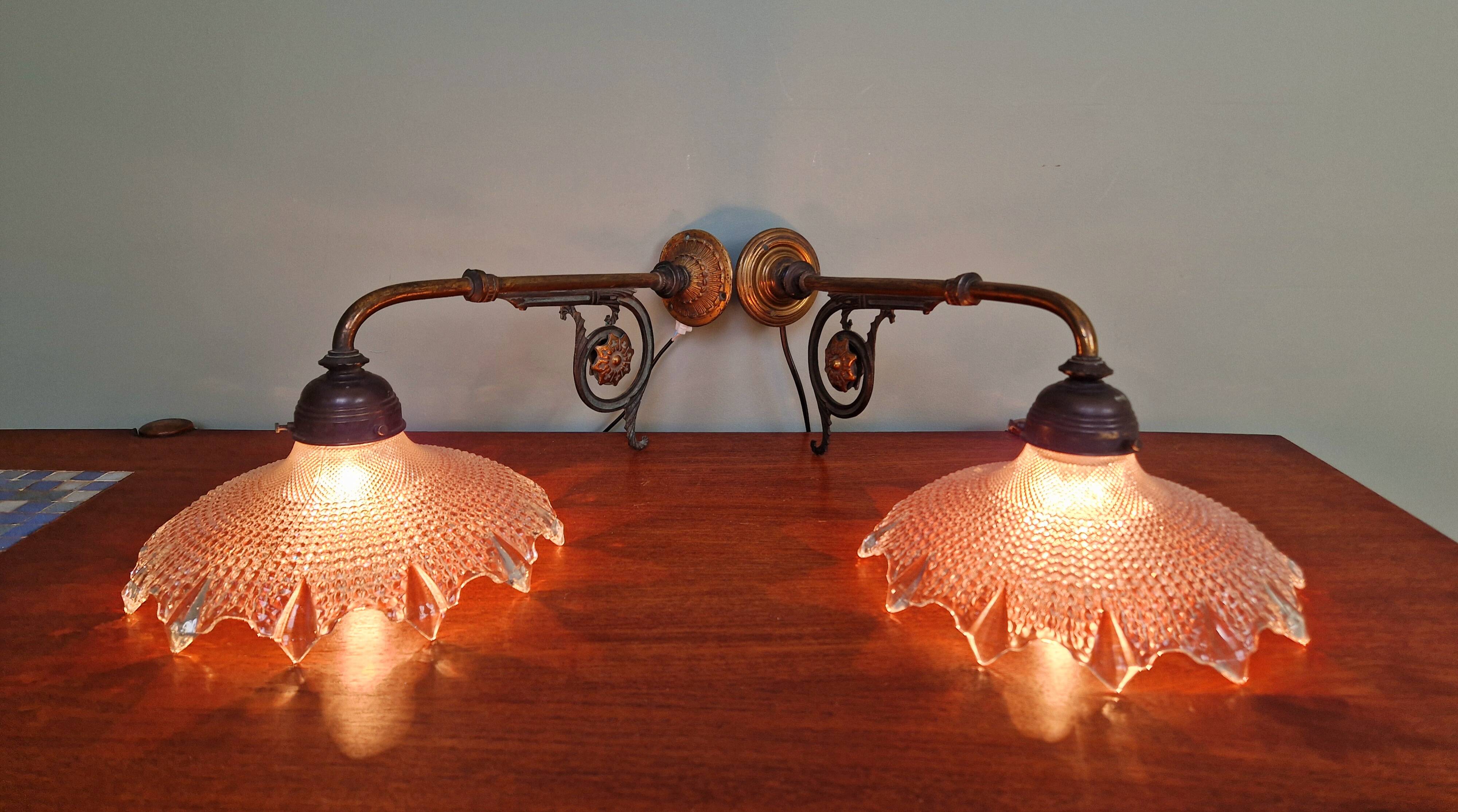 Pair of pendant lights in bronze and scalloped transparent glass