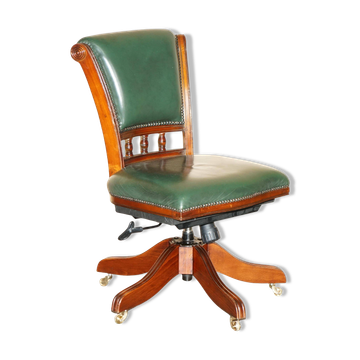 Modern captain's chair in leather, beech frame, adjustable.