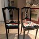 Pair of Hepplewhite neoclassical style chairs, relooked in black lacquer and faux leather.