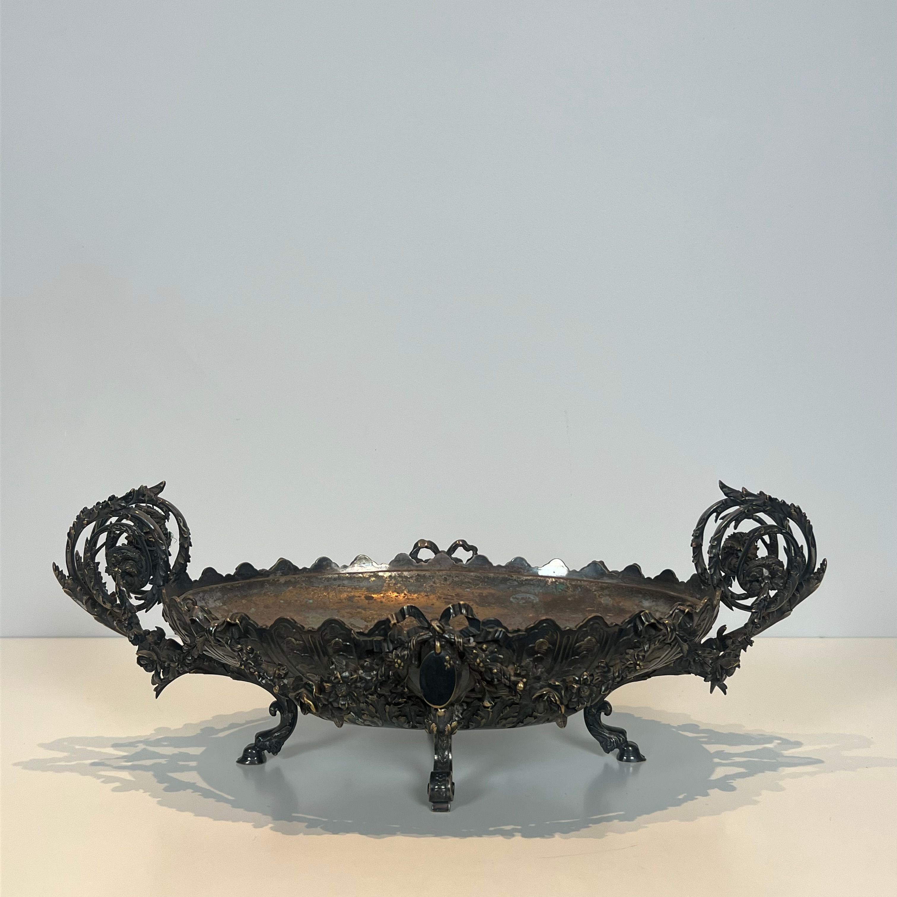 Especially a silver-plated metal table with engraving, signed.