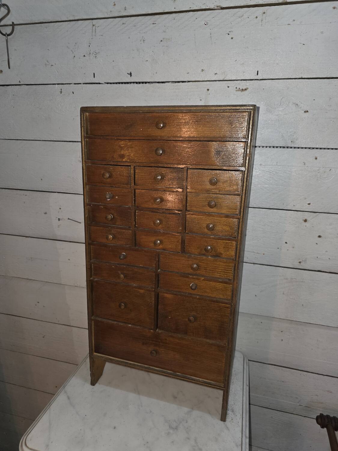 Watchmaker's workshop cabinet with drawers