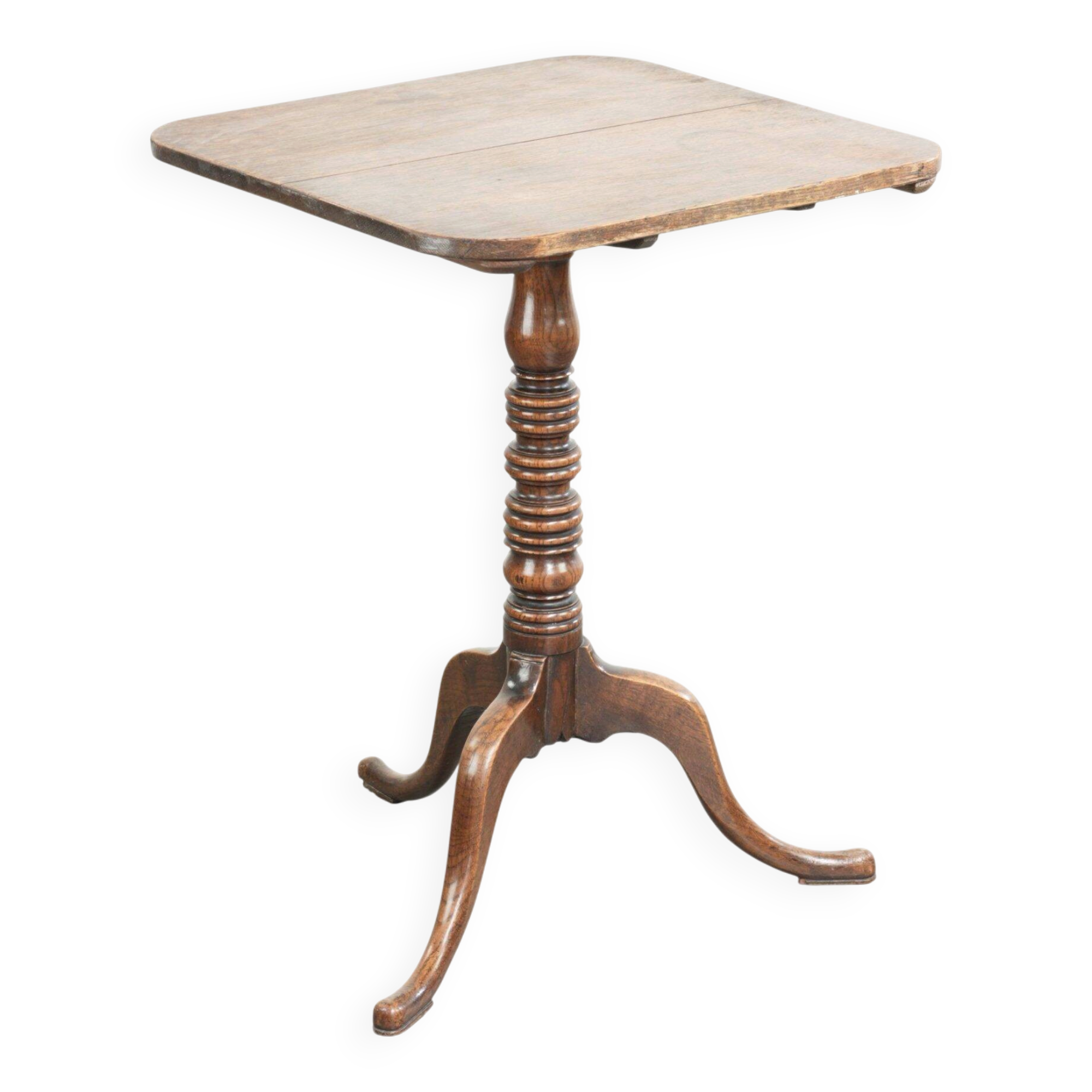 Antique English oak tilt top table from the 19th century in a unique shape