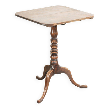 Antique English oak tilt top table from the 19th century in a unique shape