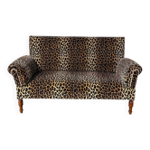Vintage leopard velvet sofa / wall sofa with drop-down arms, France.