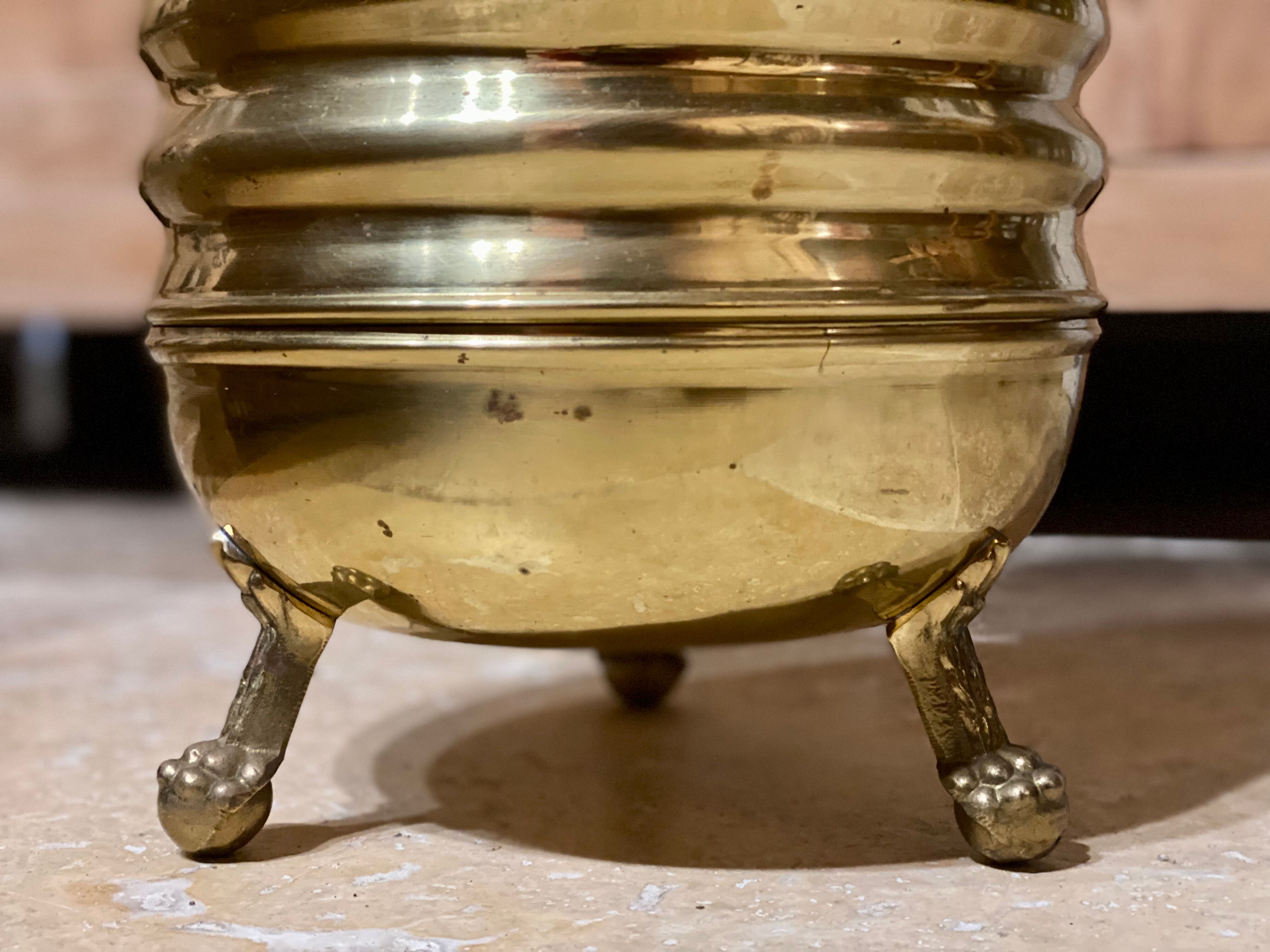 Umbrella stand in brass and bronze