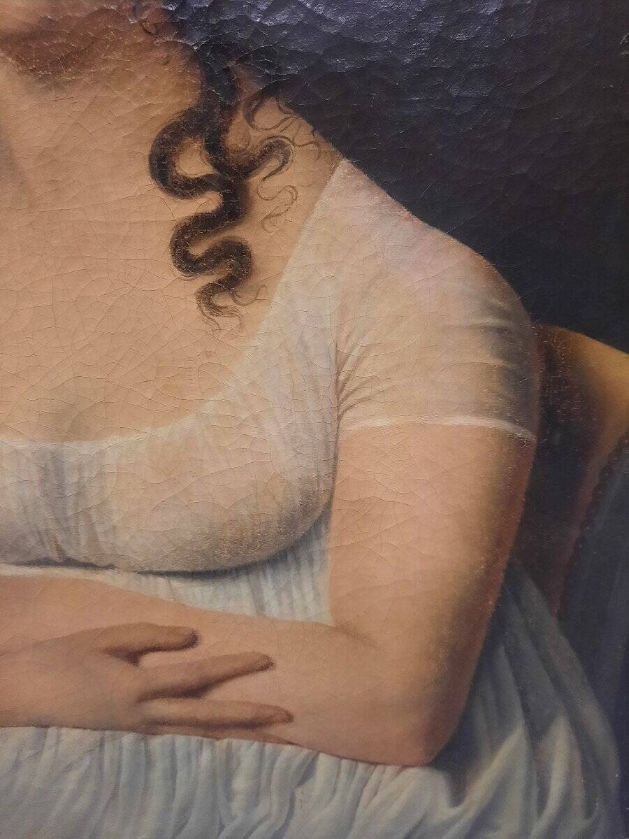 Portrait à l'huile d'une dame en robe blanche assise sur une tête de mort