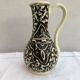 Former beige cracked ceramic pitcher