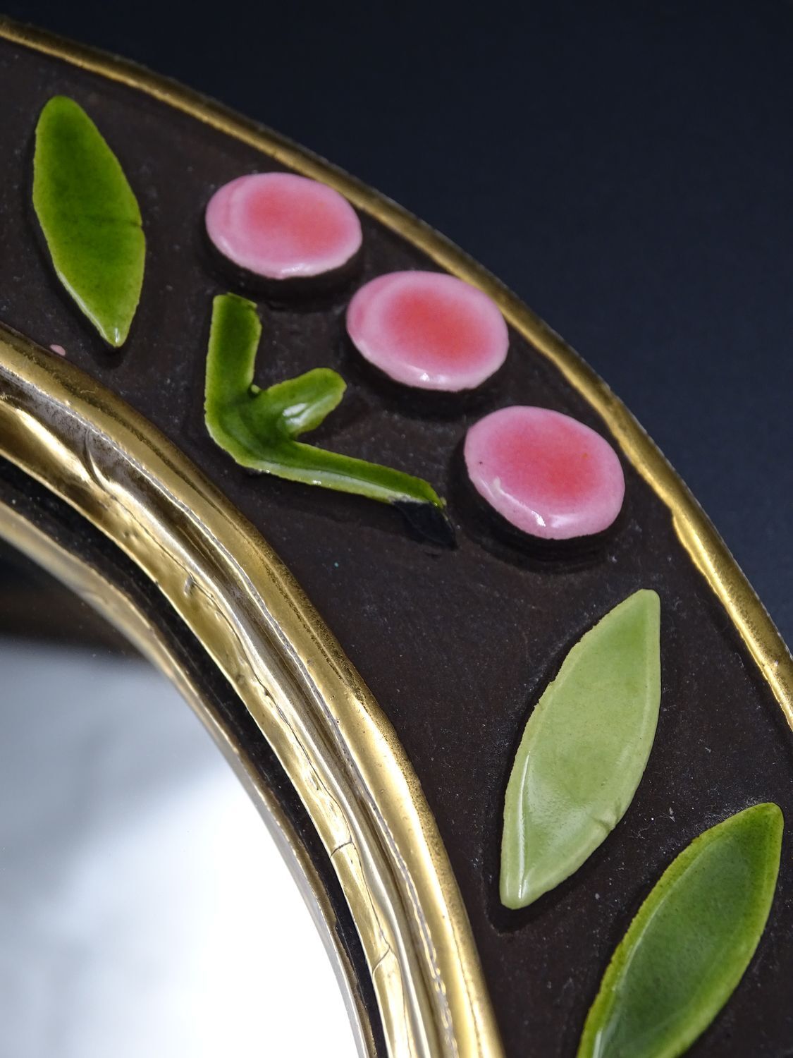 Small round mirror in earthenware- Cherry enamelled decoration - circa 1970