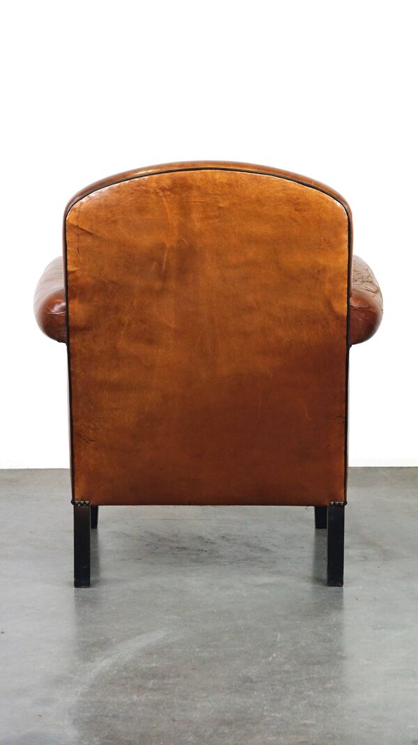 Fauteuil vintage en cuir de mouton/fauteuil design avec un look magnifique