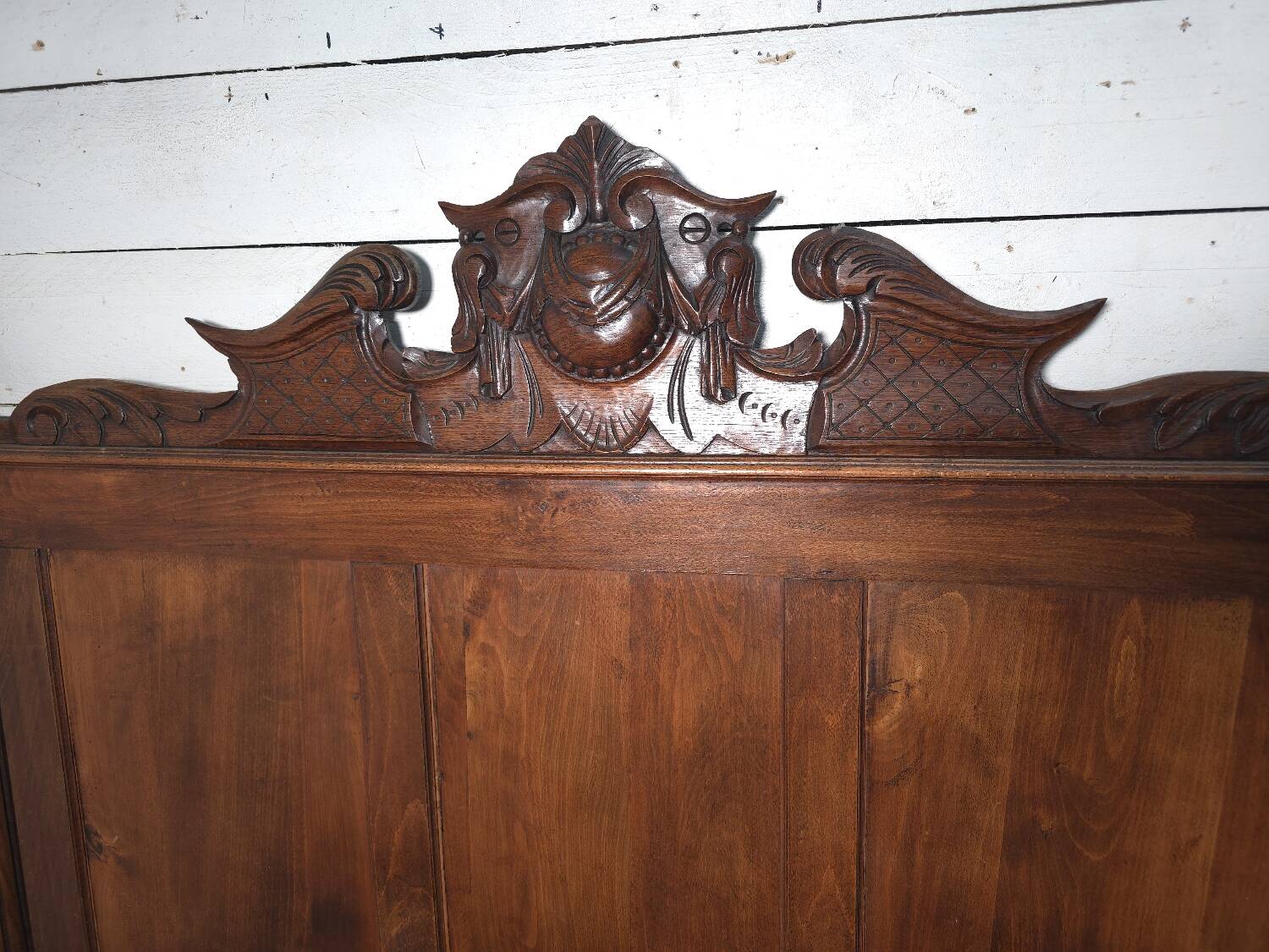 Carved beech headboard
