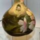 Blown glass lamp painted with a floral design, early 20th century.