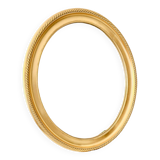 Oval wall mirror in gilded wood